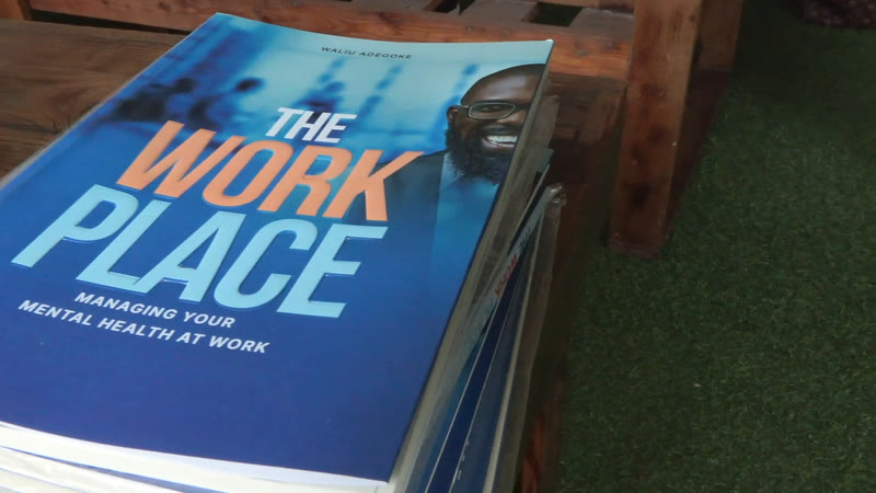 A copy of the book "The Work Place: Managing Your Mental Health at Work"